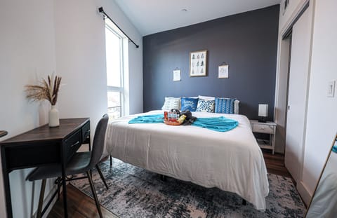 Step into comfort and tranquility. This cozy bedroom offers a plush bed, soft linens, and a serene ambiance 