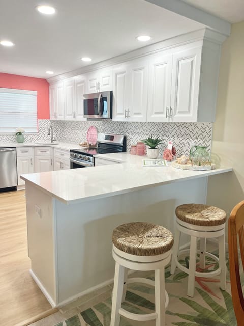 Barstools offer additional seating, perfect for enjoying a quick snack. 