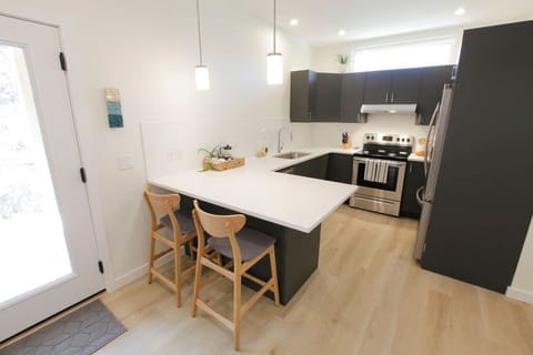 Kitchen with patio door on the left