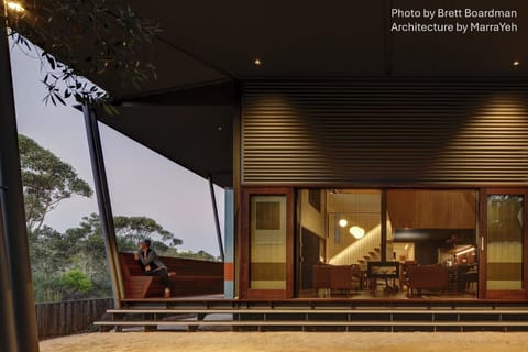 Big carport with sliding doors  for easy loading/unloading in any weather.