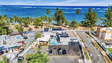 AQUA Terrazas - our entire beachfront complex with eco-friendly solar panels and lots of walkable fun and dining options.