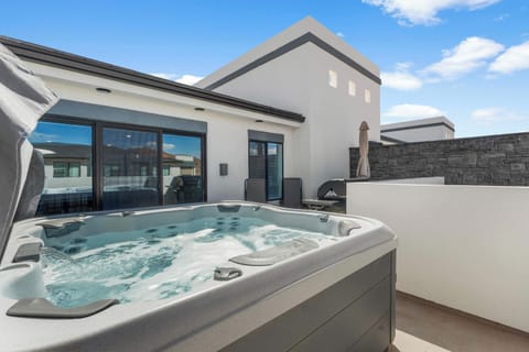 Bask in bubbling bliss in the private hot tub