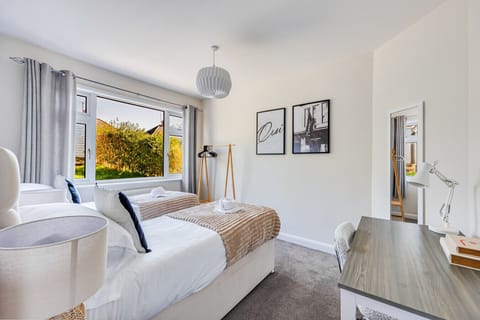Bedroom 1 - Zip and link bed set up as twin beds by default or can be zipped together as a king size bed upon request.
