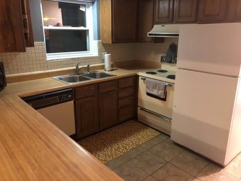Fully stocked kitchen! Ok I'm not gonna lie, it looks dated but when was the last time you saw one of these stoves give out?  They are so reliable!!  That dishwasher!  I know you can hear the sound from your childhood.