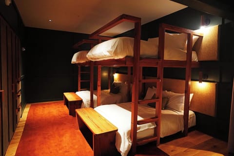Settle in together with cozy bunks and warm, ambient lighting.