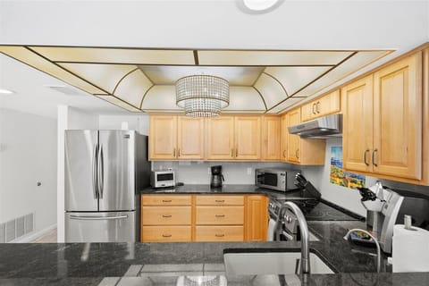 Stainless steel appliances in the kitchen, coffee makers and other gadgets available