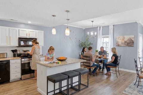 Cook, gather, and create memories with family and friends in this spacious and open kitchen.