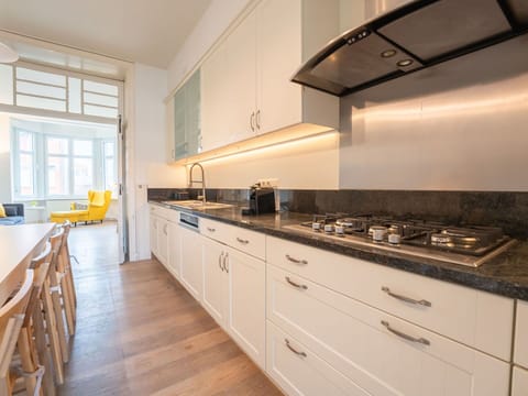 Kitchen, Countertop, Interior Design, Flooring, Cabinetry, Kitchen Appliance, Wood, Ceiling, Floor, Major Appliance