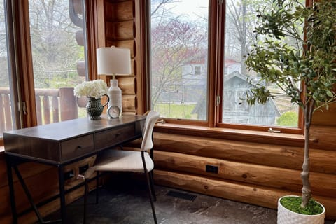 Peaceful writing desk overlooking lake
