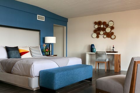 Recharge in a spacious king room with a dedicated desk.