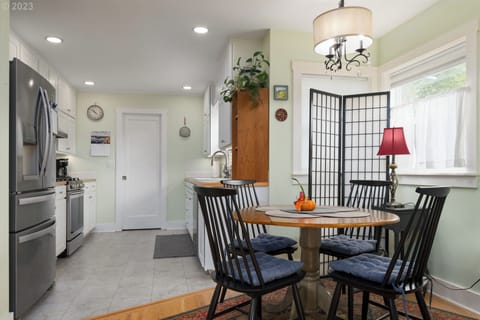 Dining area next to kitchen.
Whirlpool fridge - filtered water and ice dispenser