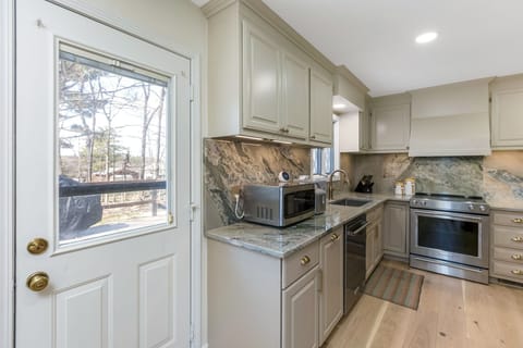 Kitchen Door Leads to Back Deck 