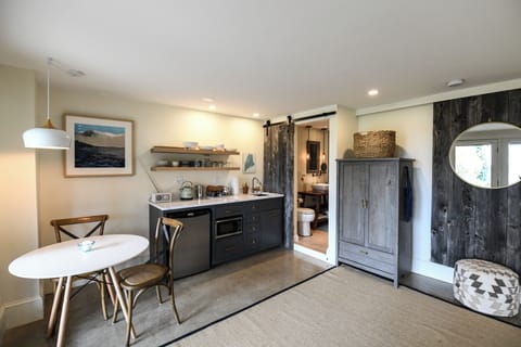 Wetbar includes mini fridge, microwave, 2 burner induction cooktop,+other basics