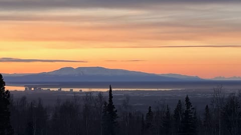 View mountains, city, and wildlife.  Popular hike starts across street.