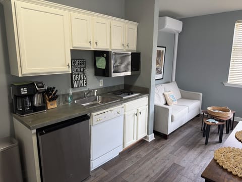 Kitchen with mini fridge, microwave and sink for your basic cooking needs