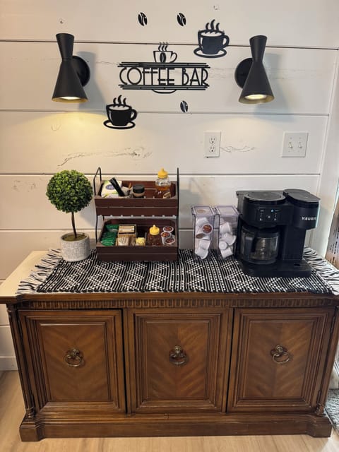 Nice coffee bar with duel Keurig coffee maker, tea, sugar, etc.