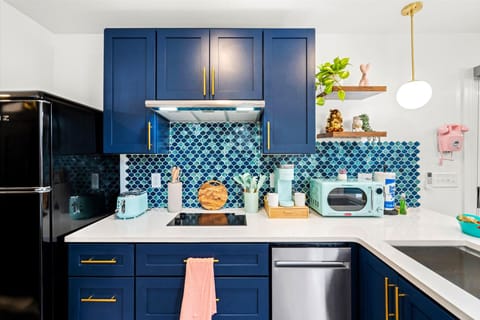 Classy, mid-mod kitchen-perfect for preparing a coffee for a connecting convo