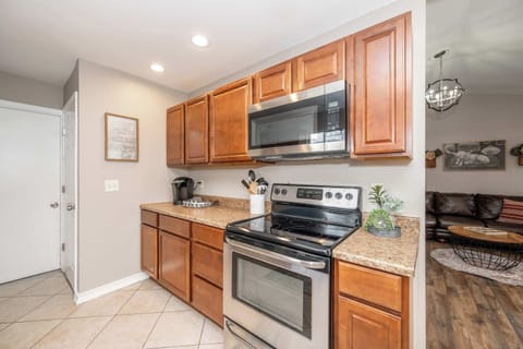 The inviting kitchen offers ample space & every home comfort
