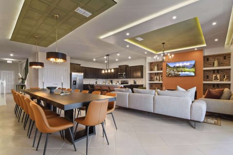 Stylish open living space with modern kitchen, dining, and lounge!