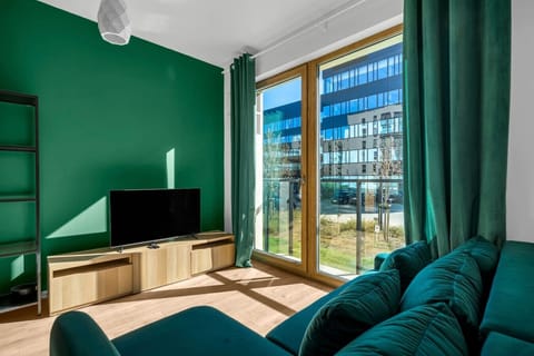 Living Room with Sofa Bed, Smart TV and Dining Table | Book Now with RENTUJEMY.COM