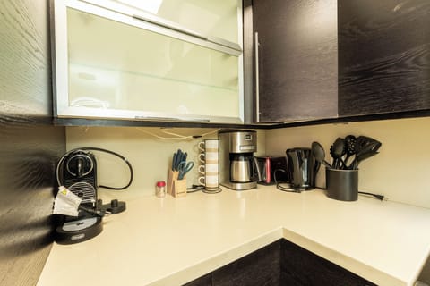 Coffee and tea station with essentials and cooking tools