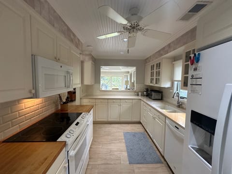 Kitchen has a pass through to dining for easy serving.