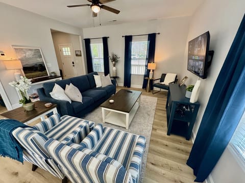 New furnishings in our open living room with smart TV and comfortable pull out sofa.