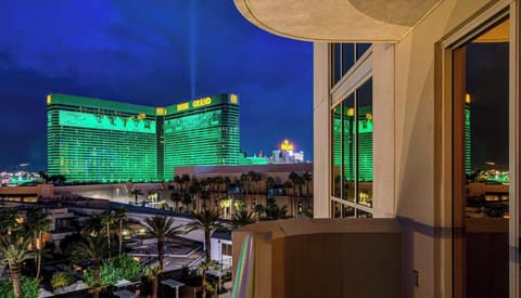 Private outdoor balcony boasting incredible nighttime views of the iconic MGM Grand
