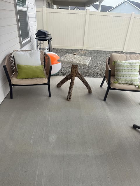 Large comfortable patio and fenced yard.