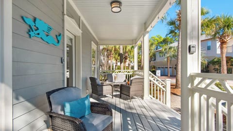 Beach Please - Spacious patio featuring stylish seating for your outdoor moments.