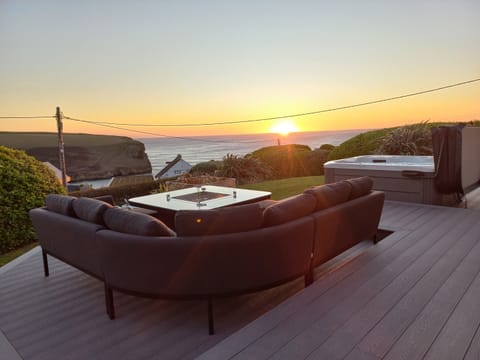 Sun setting over the sea on the deack