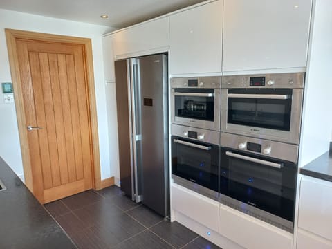 Modern kitchen with 4 ovens