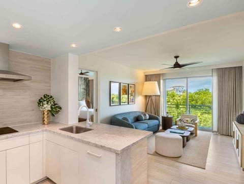 Gather for cocktails while the living room view steals attention.
