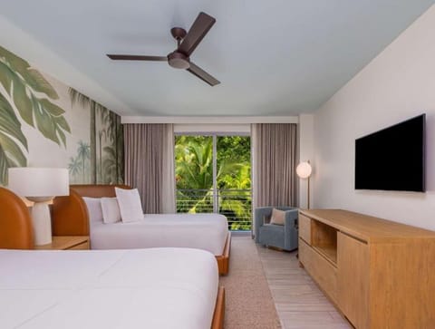 Start mornings with balcony breezes and palm-framed serenity.