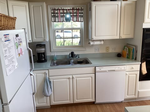 Kitchen sink area and dishwasher