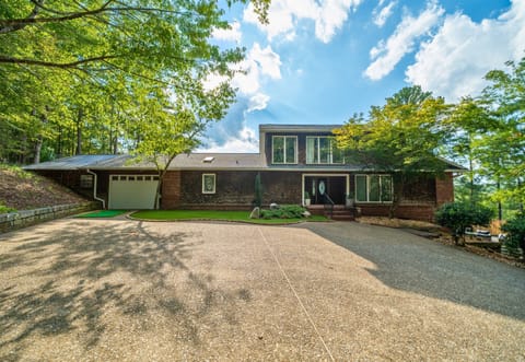 Arrive at your private lakeside retreat, where classic charm and modern comforts come together for a perfect getaway.