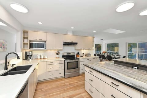Main level fully equipped modern kitchen.