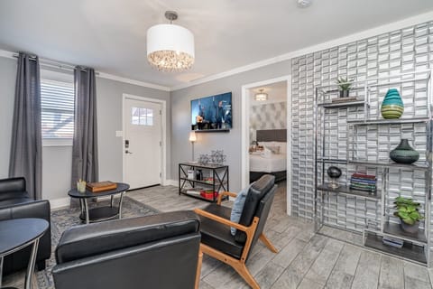 1st Unit: Relax in style with cozy seating, modern decor, and a seamless flow to the kitchen—perfect for comfort and connection!