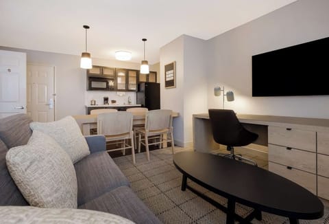 Settle into the sofa, stream favorites, then dine together.