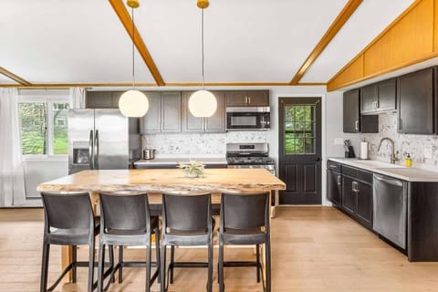 Island seating and door to the back deck