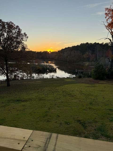 Our spacious backyard is packed with fun—kayaking, cornhole, and scenic sunset views.