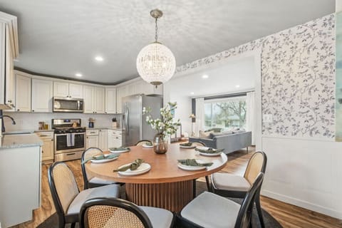 Open concept living area, flowing effortlessly from the kitchen to the living room