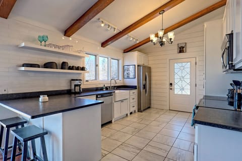 Entry door and kitchen. 