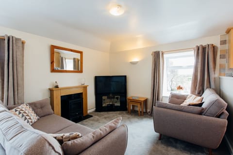 The Hayloft lounge at Trevalgan Farm Holidays