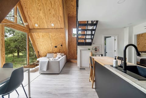 The open concept living room provides a peaceful and relaxing hang out space.