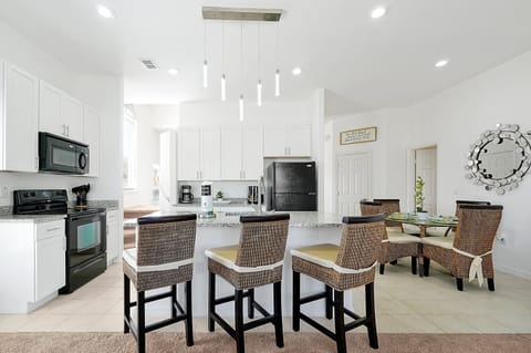 Host unforgettable meals in the elegant dining room—where style meets comfort