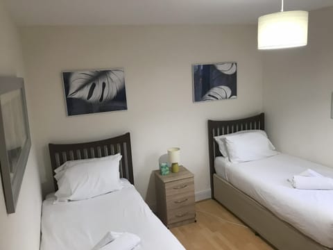 Single beds - can be made into super king (on request)