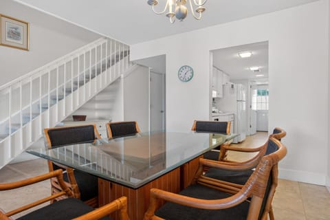 Enjoy meals at the dining table with seating for six guests.