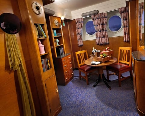 Sip wine and share bites in your private cabin nook.