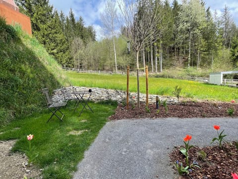 Guests can enjoy their own garden area with a table and chairs.